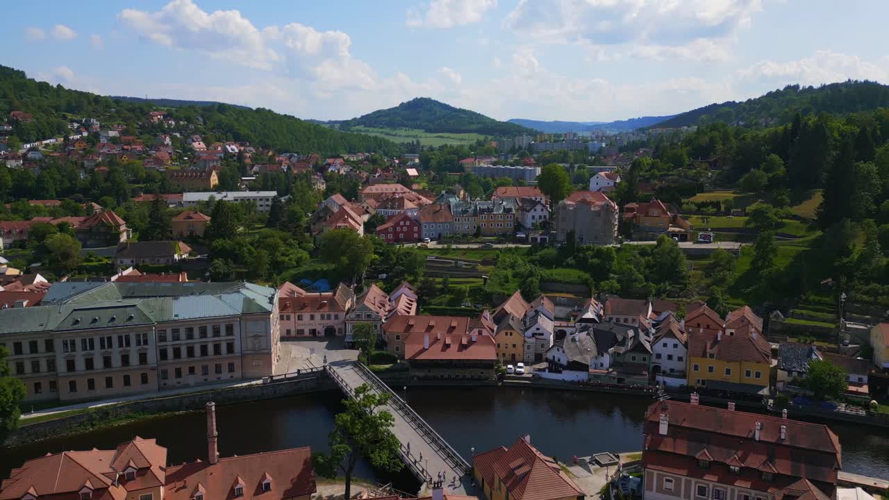 Nice aerial top view flight Czech Republic historical Cesky Krumlov Vltava bridge river in summer time 2023, world heritage in Bohemia