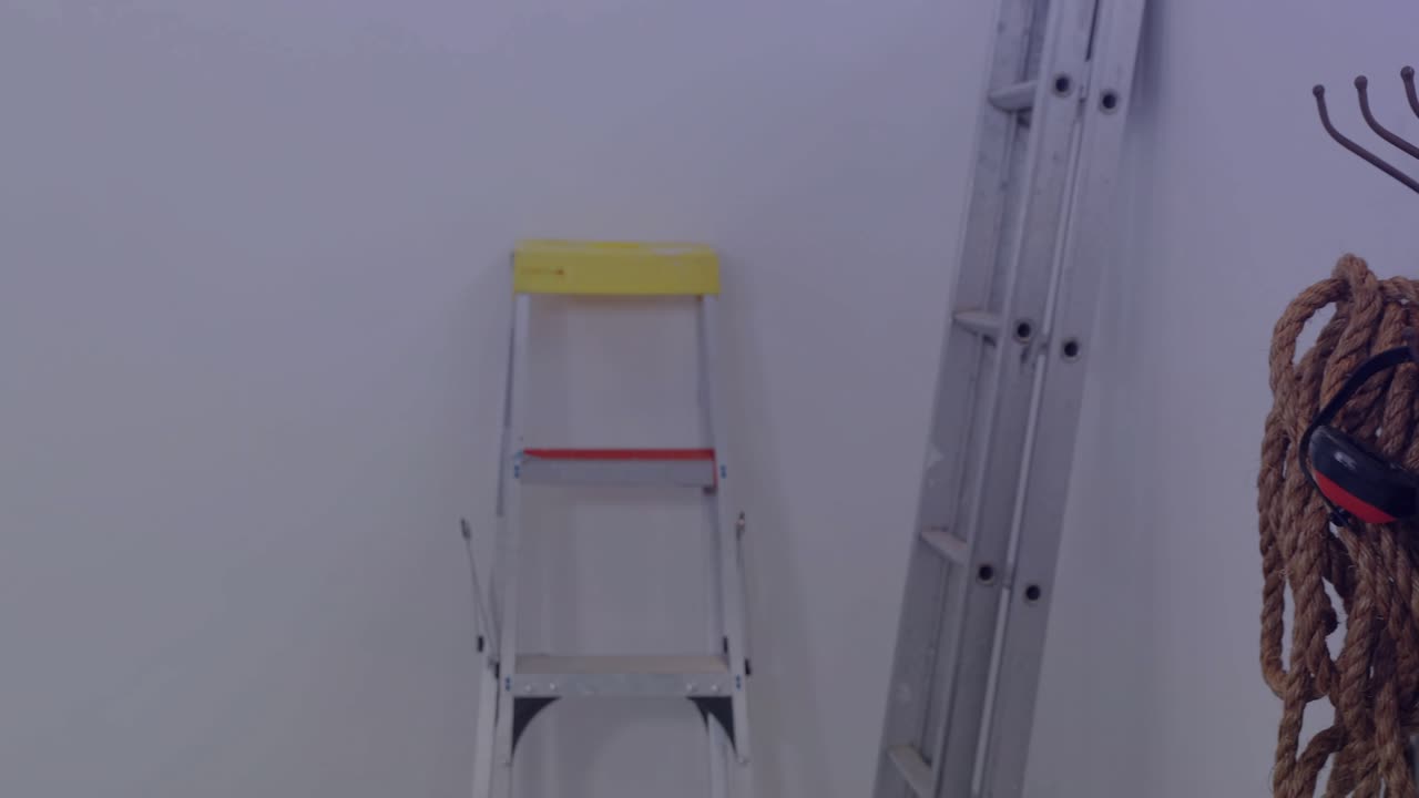 Adjusting helmet strap, firefighter checking gear reaching rack overlay tracing helmets ropes ready