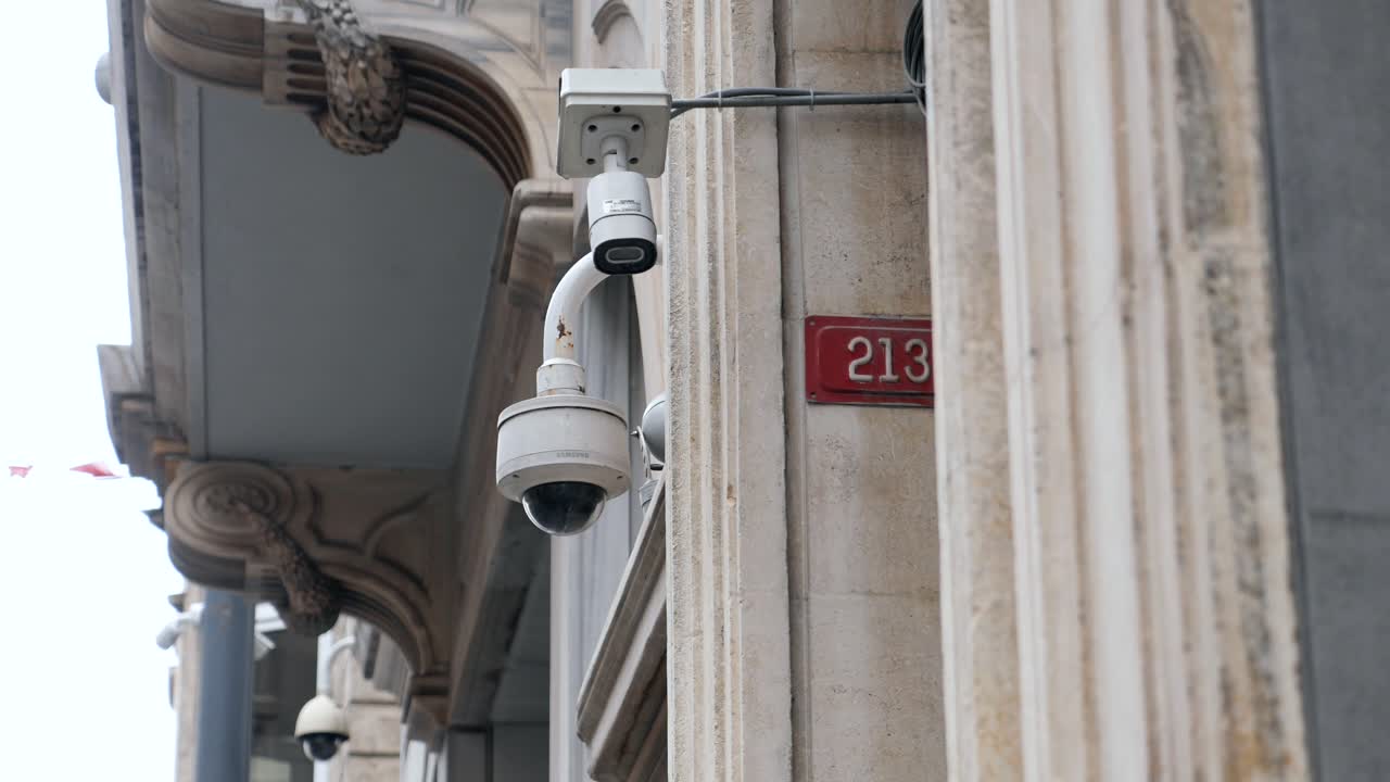 Security Camera Mounted on a Building Wall