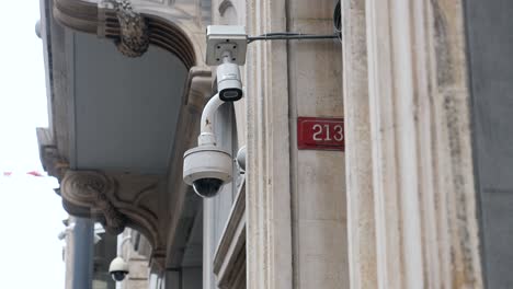 security camera mounted on a building wall