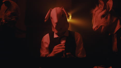 masked people in a dark nightclub