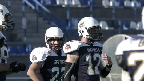 american football players on the field