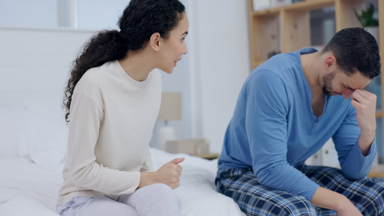 Divorce, fight and couple on a bed with stress