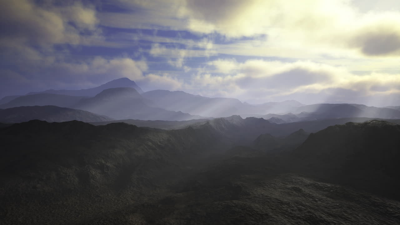 Misty mountain landscape under a soft golden glow at sunrise