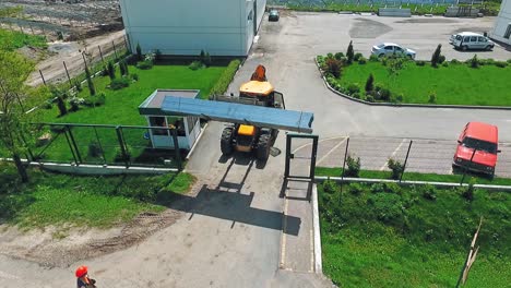 machine on construction site. aerial view of worker and heavy machine working at construction site