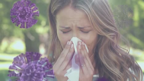 mujer caucásica soplando la nariz con la propagación del coronavirus covid19