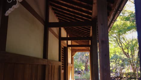 4k-Slow-motion-tilt-of-Buddhist-Temple,-Gotokuji-Temple-in-Setagaya-Tokyo