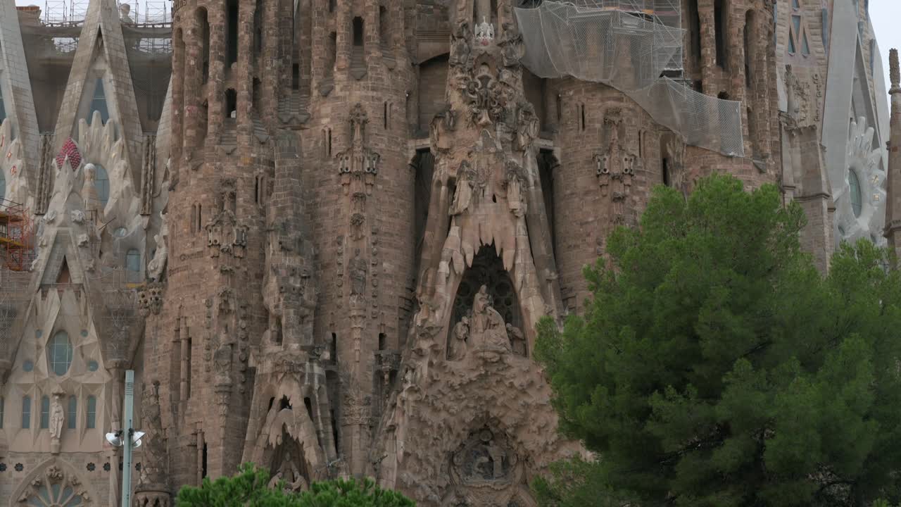 Tilt up view of showcasing the Sagrada Familia, the largest unfinished Catholic church in the world and part of a UNESCO World Heritage Site
