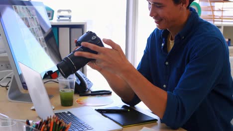 male executive clicking a picture on digital camera 4k