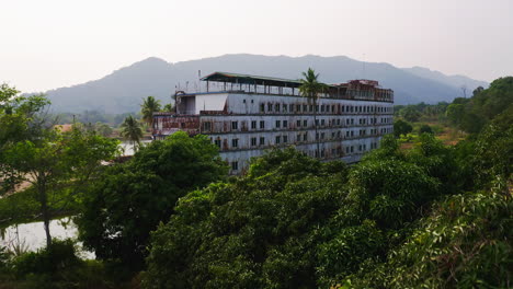 Rusting-sealed-off-cruise-ship-in-jungle-lagoon-in-Koh-Chang-resort