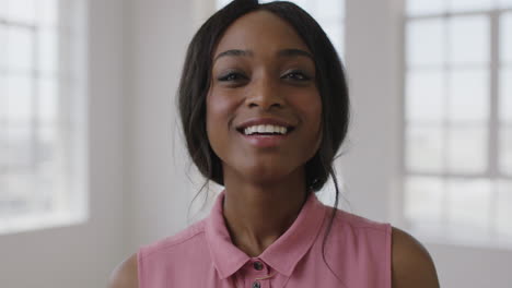 slow-motion-portrait-of-young-attractive-african-american-woman-laughing-happy-enjoying-positive-lifestyle-move-in-new-apartment