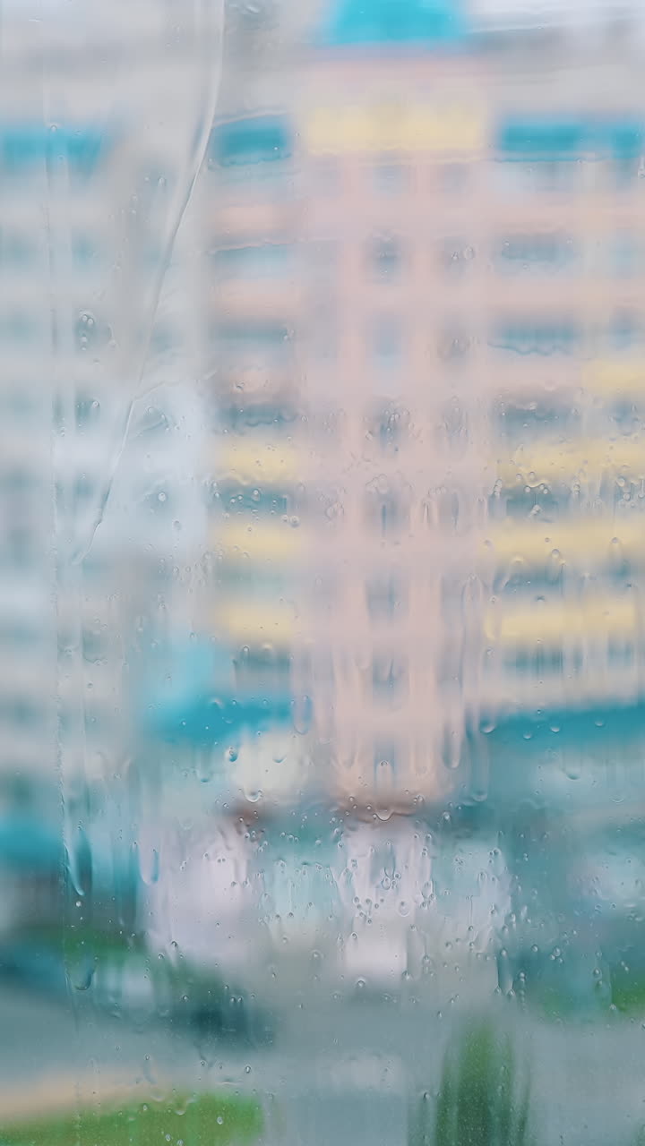 Cleaning window with squeegee. Window cleaner with squeegee cleaning glass window