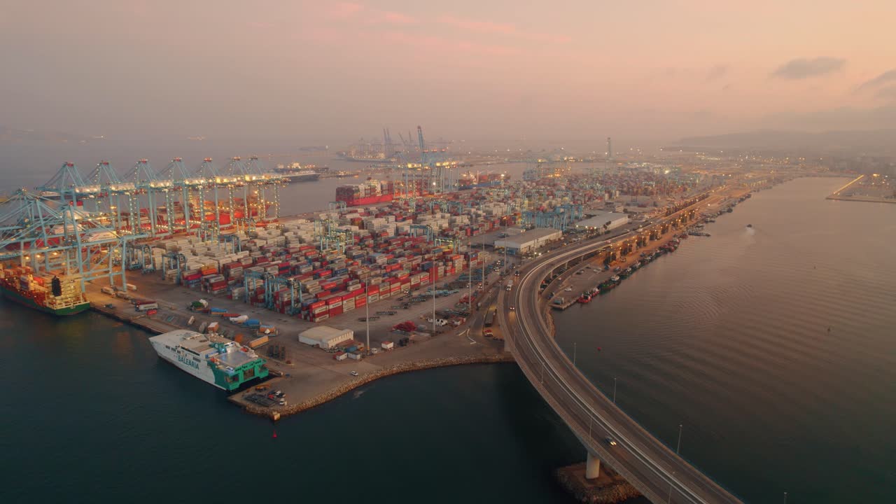 Cinematic Shot Of Algeciras Shipping Port Near Suspended Long Bridge, Spain