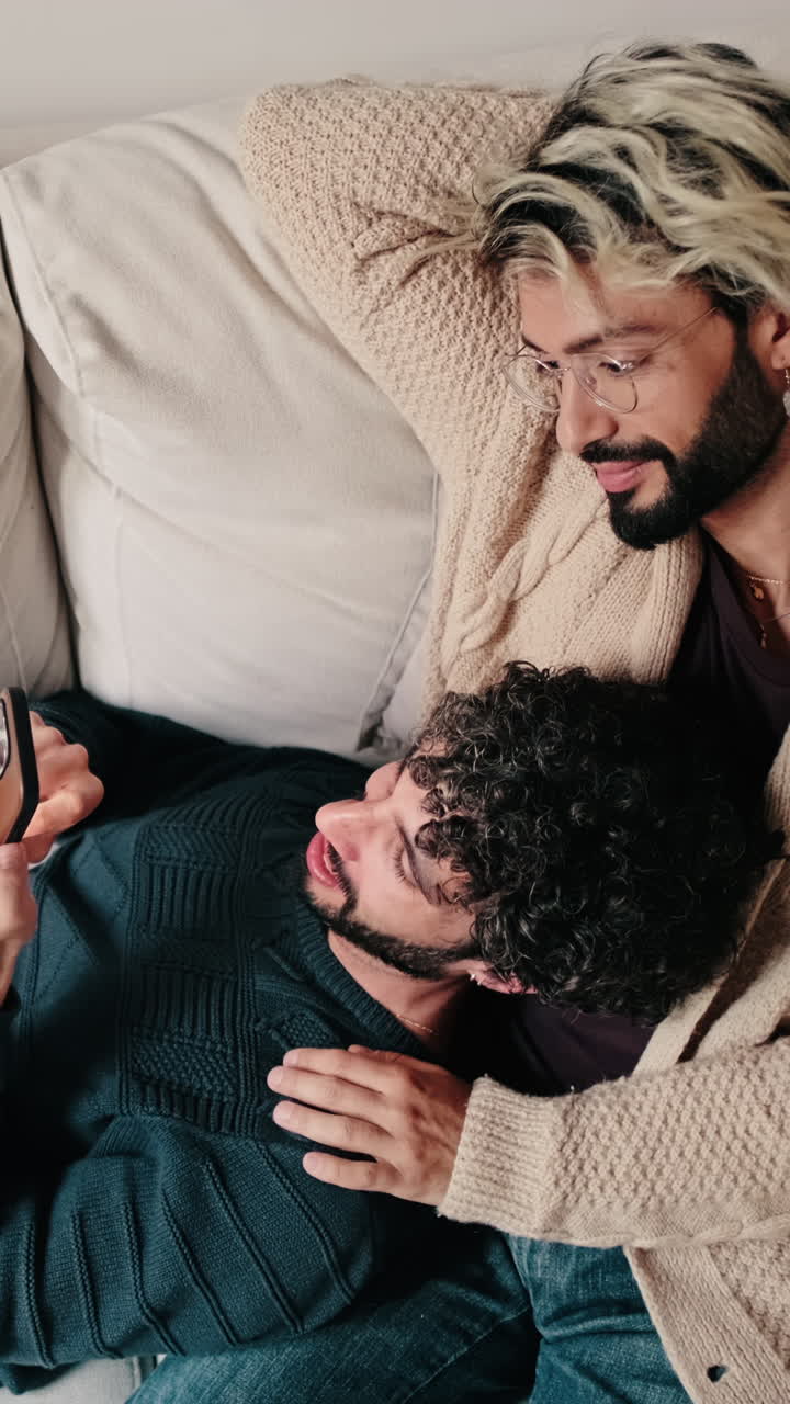 Gay Couple Relaxing at Home Together