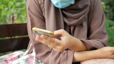 Close-up-of-women-hand-holding-smart-phone