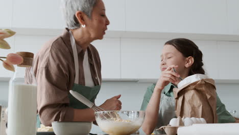 grandma and girl baking