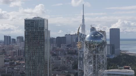 cinematic daytime drone footage of batumi skyline and skyscrapers.
