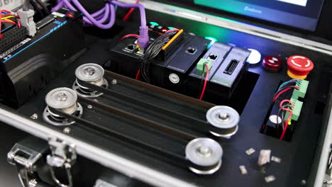 electronic control system with pulleys and emergency stop button