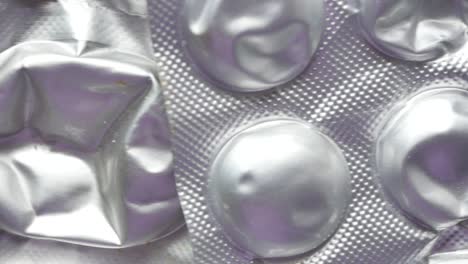 close-up of empty and crumpled blister packs of pills