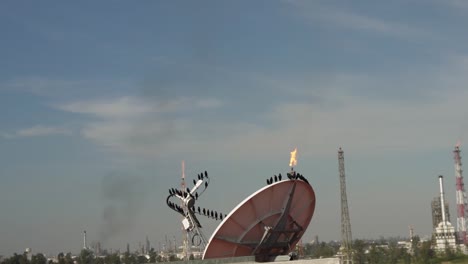 slow motion of birds flying in a refinery