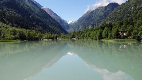 Klammsee-By-Kaprun-City-In-Austria-With-Beautiful-Mountains-And-Lake---aerial-shot