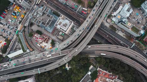 Downtown-Hong-Kong-city-skyscrapers-and-urban-traffic,-Aerial-view