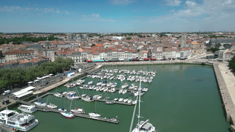 luxury catamaran in la rochelle port with cityscape, charente maritime in france