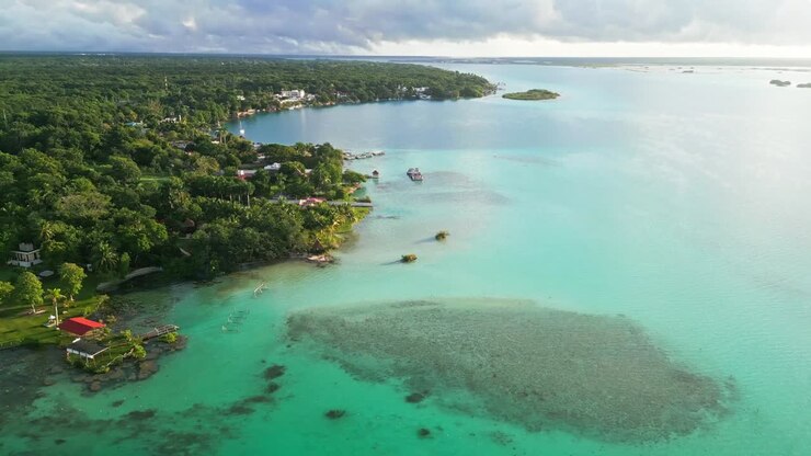 Stunning aerial view of Bacalar's lake and lush greenery in Mexico