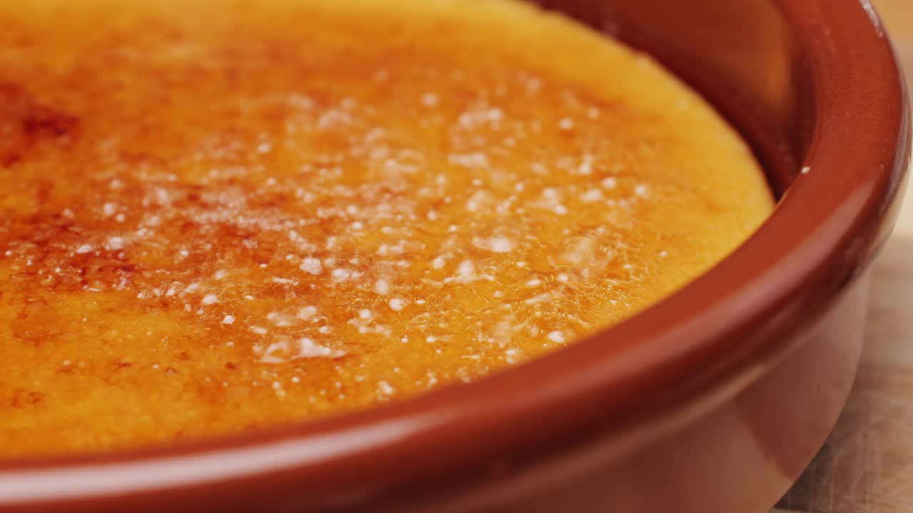 Spanish traditional food, catalonian dessert, crema catalana, catalan cream, spanish dessert close up, cooking.