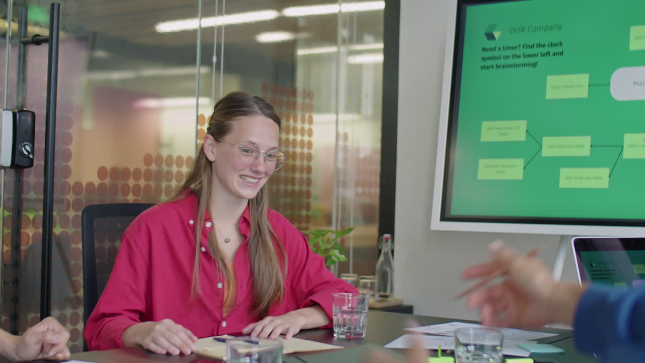 Gen Z Colleagues Having Discussion on Office Meeting