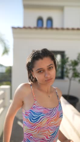 woman in a colorful swimsuit outdoors