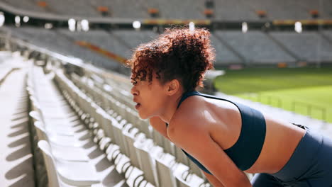 woman resting in a stadium