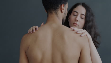 interracial couple hugging