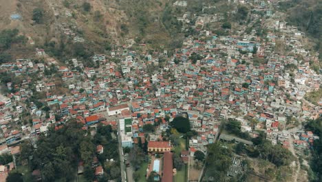 Panoramic-View-Of-Santa-Catarina-Palopo-Municipality-In-Lake-Atitlan,-Guatemala---aerial-drone-shot