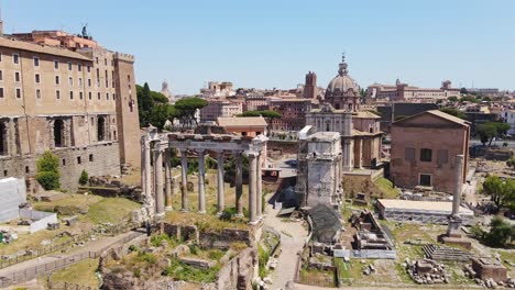 iconic roman ruins in the forum, captured from above on a sunny day, rome, italy