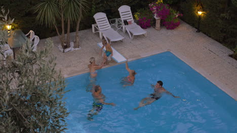 family bathing in the swimming pool