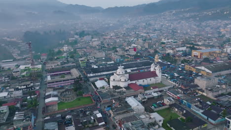 fast aerial rotation around the central cathedral in san juan ostuncalco, guatemala