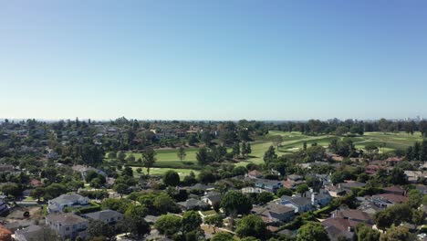 drone shot of golf club fields and houses in century city, los angeles ca usa neighborhood