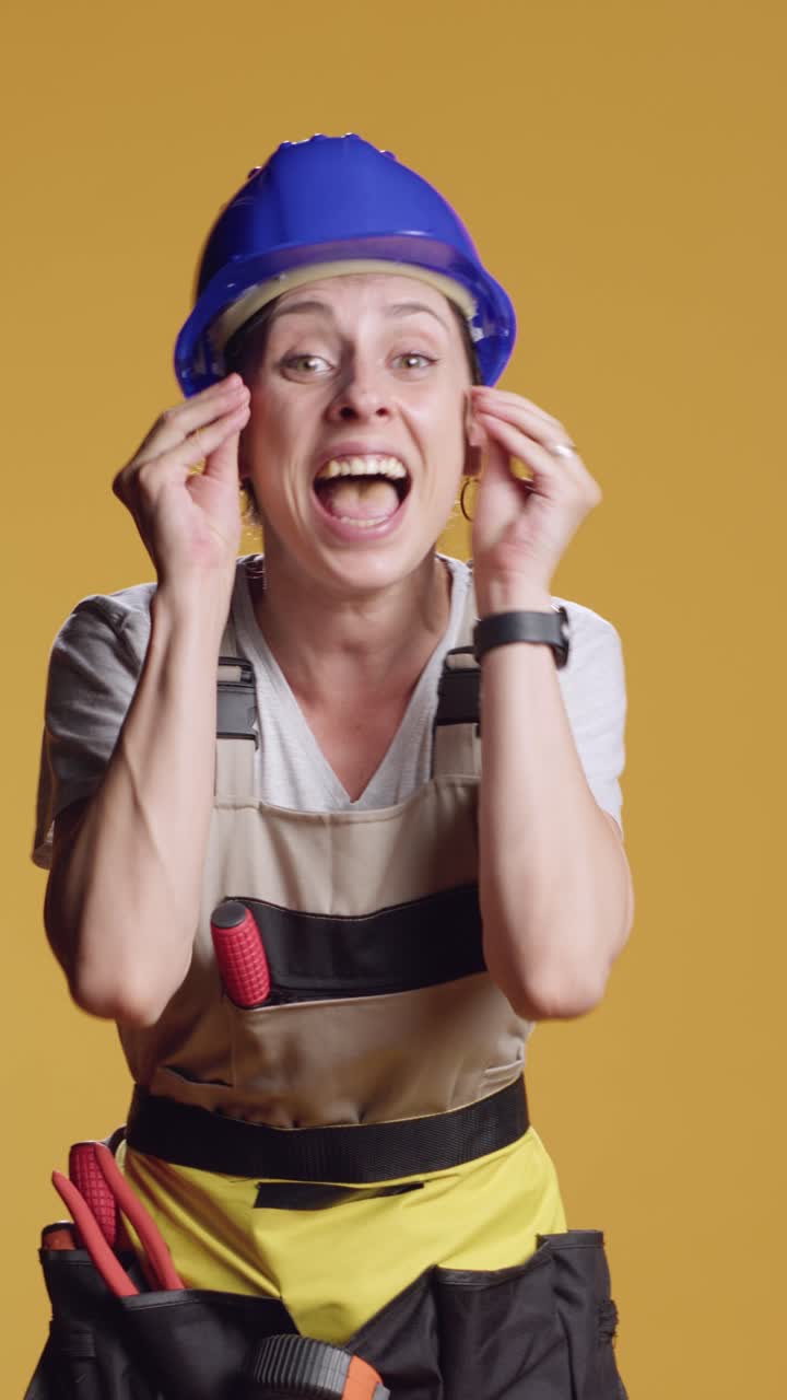 Vertical video: Angry frustrated woman having argument in studio