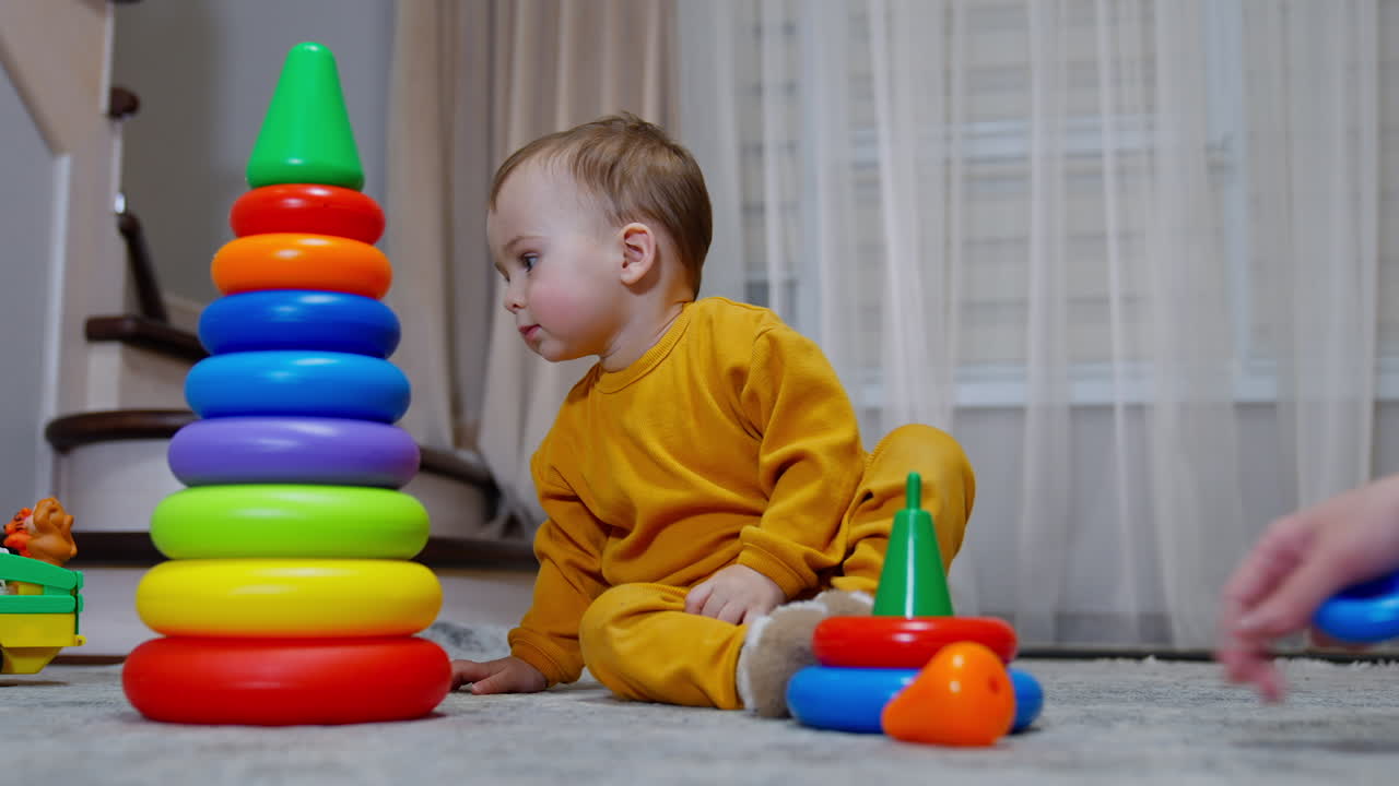 Baby Playing with Stacking Rings