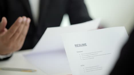 close up shakes hands to greet a hr staff before a job interview to apply for a job. happy woman seeker or insurance broker presenting a business deal. business woman sending resume.