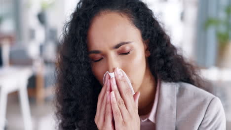 sick, blowing nose and sneezing business woman