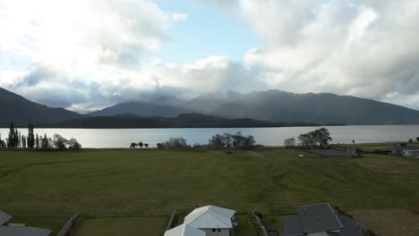 fly over aerial drone footage at lake te anau, new zealand