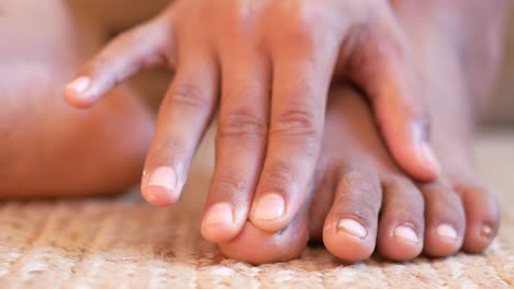 Close-up-on-young-man-suffering-feet-pain