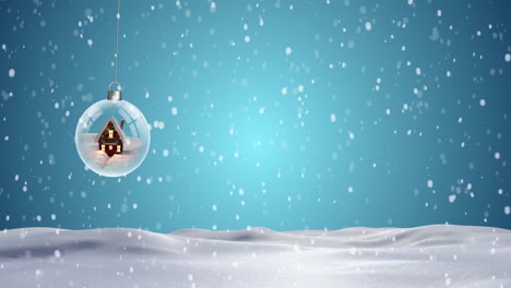 Christmas-bauble-dangling-against-snowflakes-falling-on-blue-background