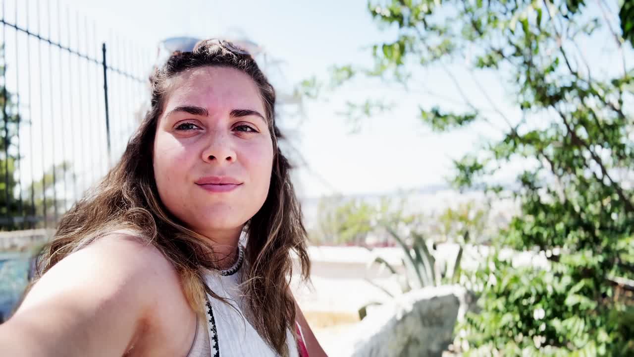 Vlogger Woman Taking a Selfie on a Sunny Day