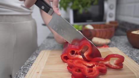 chopping red bell pepper