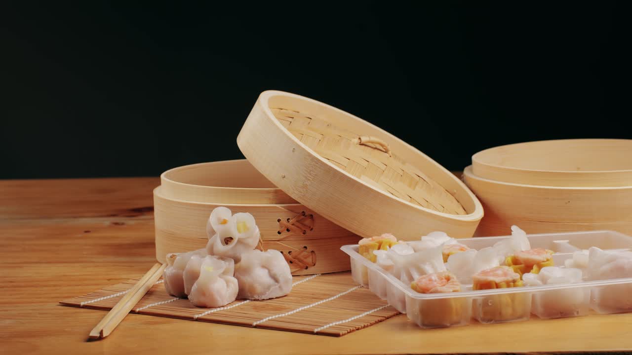 Various of frozen dim sum close-up macro. Food to take away. Chinese dessert food. Dimsum with shrimps, fish and meat. Dish in a cafe. Delivery