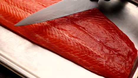 preparing raw salmon