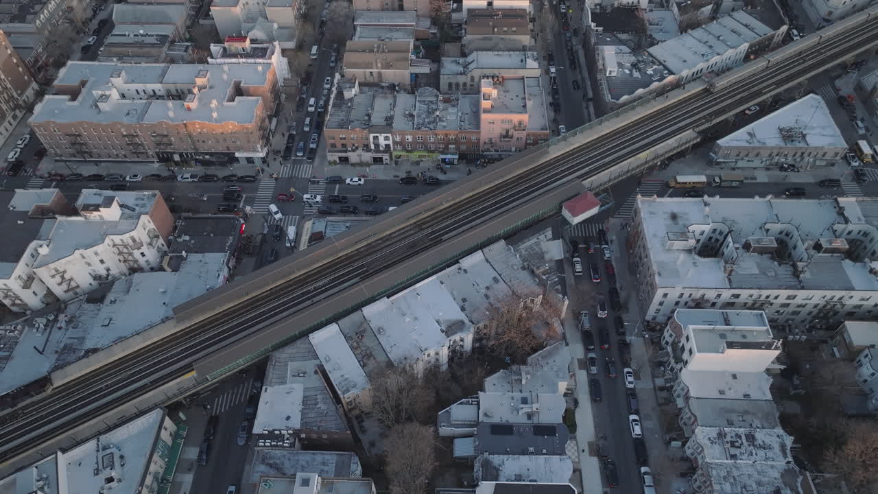 Aerial view of the subway passing through Brooklyn. Shot at dusk.